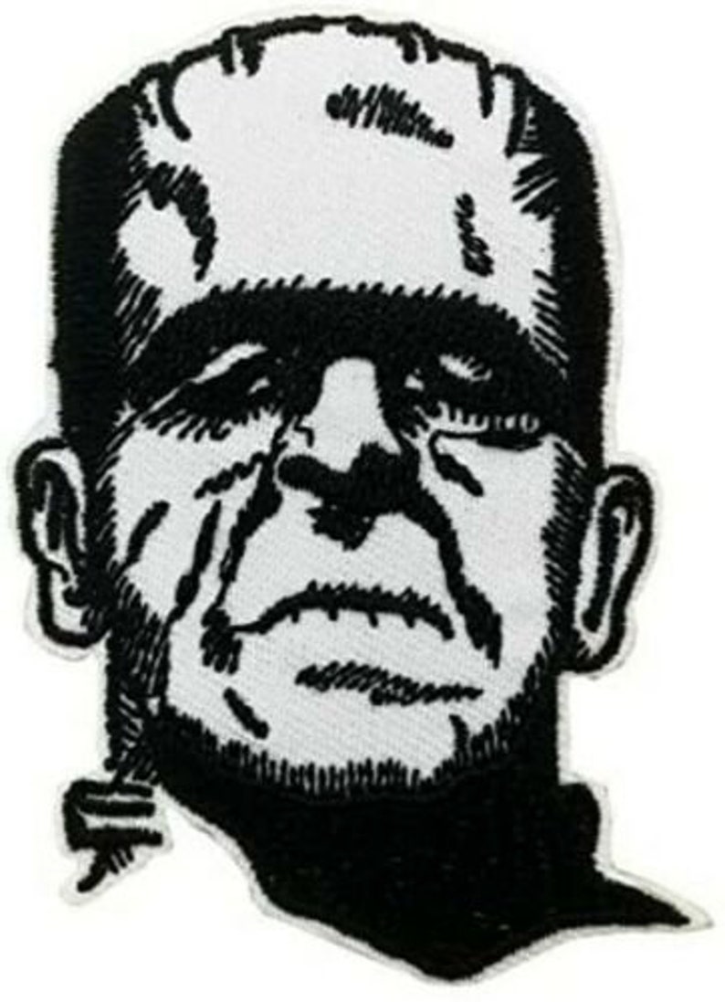 Peut inclure: Patch brod&eacute; en noir et blanc du visage du monstre de Frankenstein. Le patch est d&eacute;taill&eacute; avec des points de suture et un front pliss&eacute;.