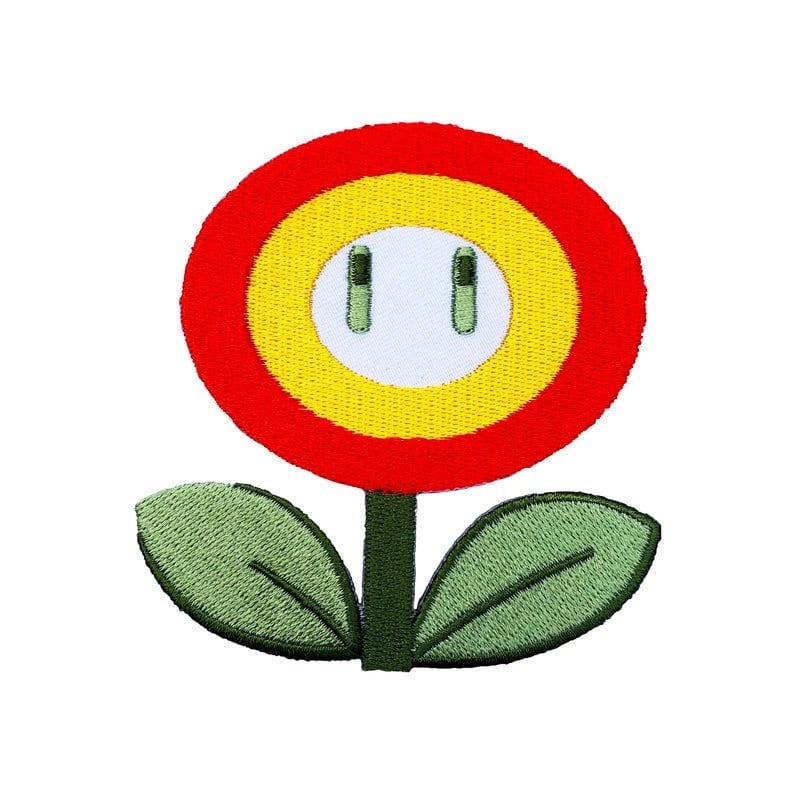 Może przedstawiać: Czerwono-ż&oacute;łty kwiat z białym środkiem i dwoma zielonymi liśćmi. Środek kwiatu ma dwa czarne koła.