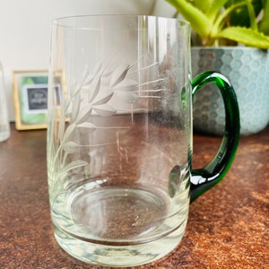 Vintage glass mug / cup, green handle, etched floral decorative embellishment