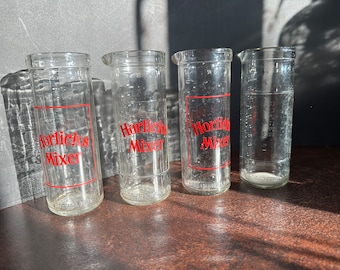 Set of Vintage Horlicks glass measuring jugs / mixers