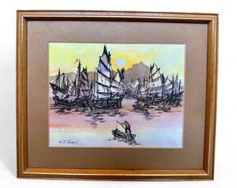 May include: A framed watercolor painting depicting a fleet of traditional Chinese junks sailing on a calm body of water. The painting is set against a backdrop of a sunset sky with a soft pink and orange hue. The artist's signature, "W.F. Pearl", is visible in the lower left corner of the painting.