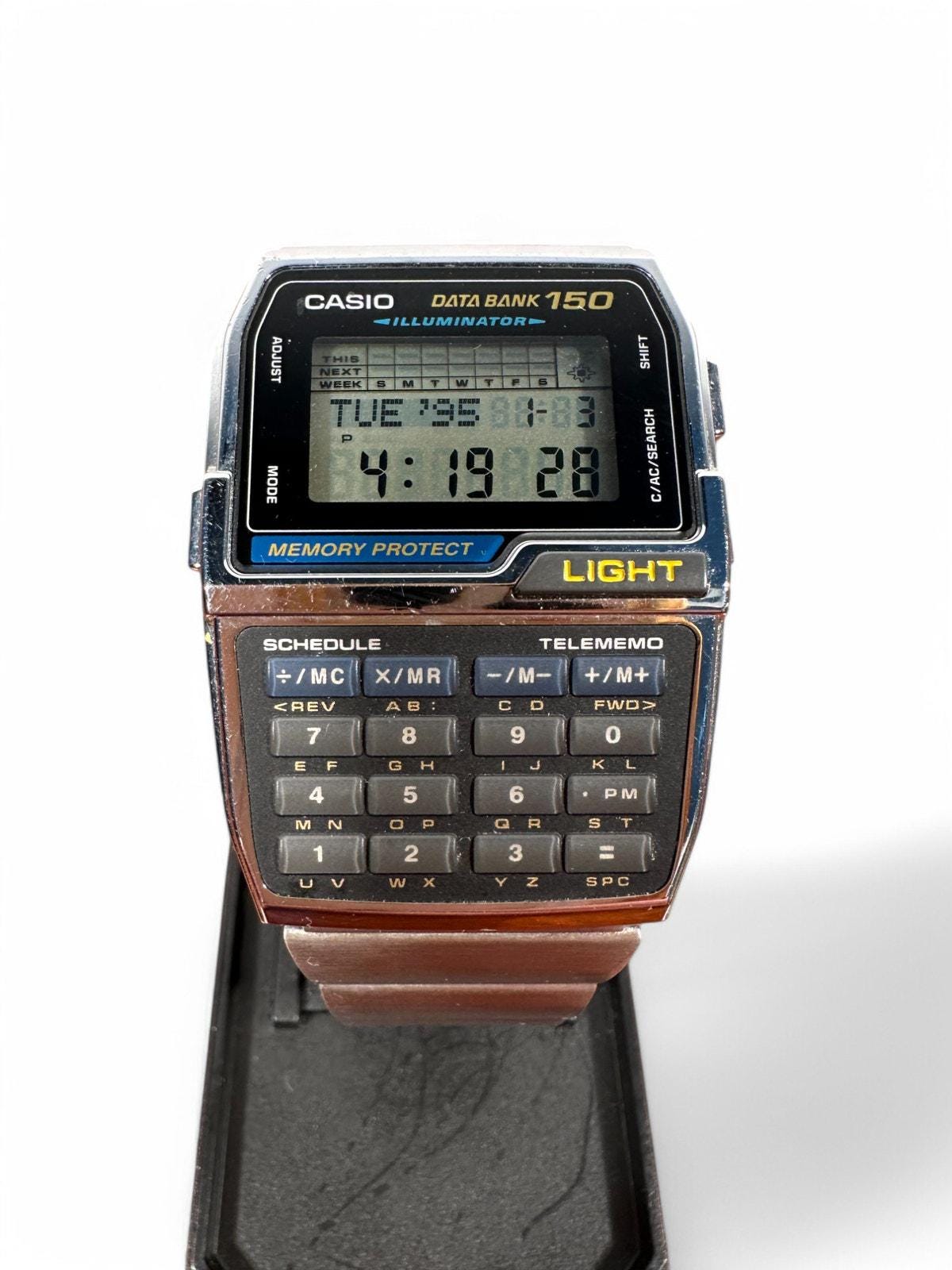 CASIO DATA BANK 150 ILLUMINATOR 腕時計 Vintage Casio Data Bank 150 Illuminator DBS-1500 / 1477 - Etsy