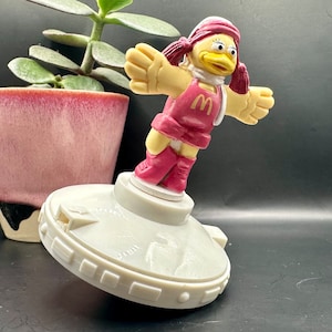 Vintage, McDonald’s spinning winter sports Birdie figure, toy 1994