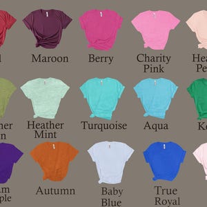 May include: A chart showing 15 different colors of t-shirts. The colors are: Red, Maroon, Berry, Charity Pink, Heather Peach, Heather Green, Heather Mint, Turquoise, Aqua, Kelly, Team Purple, Autumn, Baby Blue, True Royal, and Soft Pink.