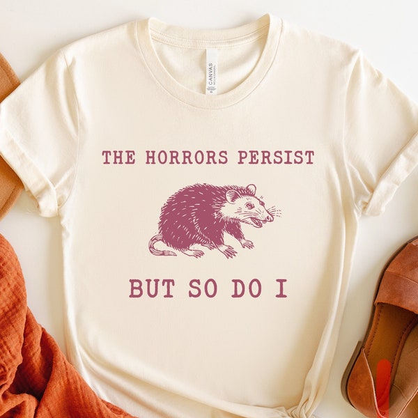 The Horrors Persist But So Do I, Sarcastic Shirt, Funny Mental Health, Meme Shirt, Raccoon Gift, RM-350