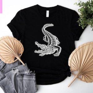 Fun and wild alligator tee for animal lovers! Great for camping, hiking, or gifting. Show off your love for gators in style and comfort.