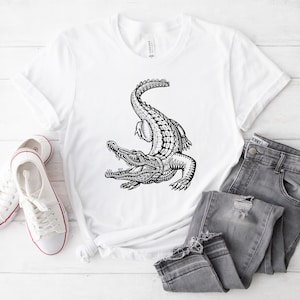 Fun and wild alligator tee for animal lovers! Great for camping, hiking, or gifting. Show off your love for gators in style and comfort.