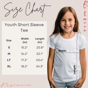 a young girl wearing a white shirt with the size chart