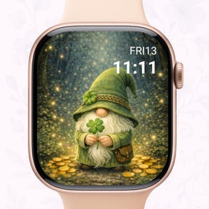 May include: A rose gold smartwatch with a screen displaying a whimsical gnome holding a four-leaf clover. The gnome wears a green hat and coat, set against a forest backdrop. The time reads 11:11, and the date is Fri 13.