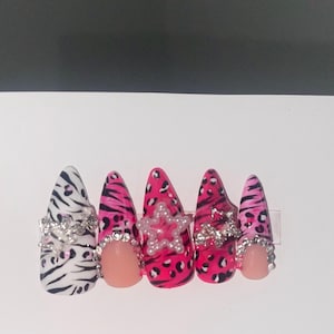 Y2K Nails with zebra and cheetah print | press on nails | handmade nails | pink nails | animal print nails | star nails