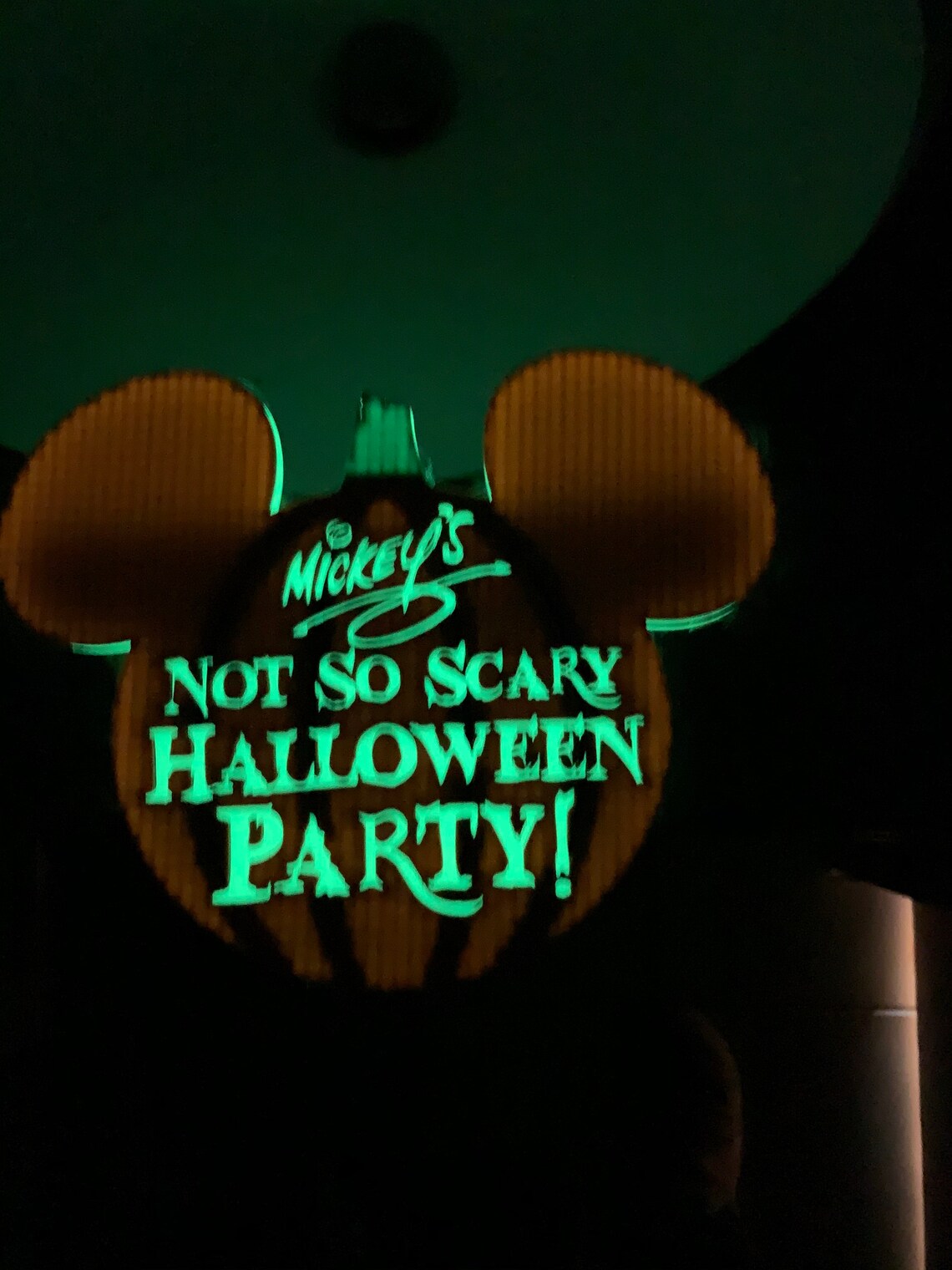 Mickey's Not so Scary Halloween Party Sign glows in the Etsy