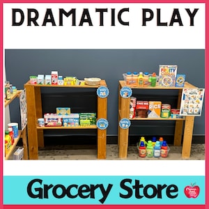 May include: A wooden grocery store play set with shelves stocked with toy food items, including cereal boxes, milk cartons, juice bottles, and ice cream containers. The shelves are labeled with signs that say "Dairy", "Baking", and "Breakfast".