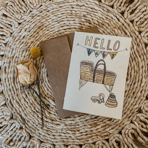 Hola tarjeta de felicitación del bebé