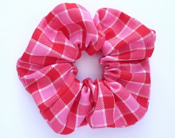 Coletero de tartán rosa y rojo