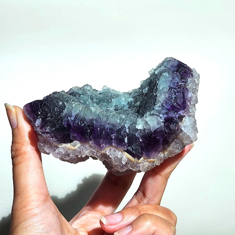 Rainbow Fluorite specimen on white fluorite cubic matrix. This unique rough mineral has beautiful layers of white, purple and green fluorite. Perfect gift to all crystal collecting family and friends.