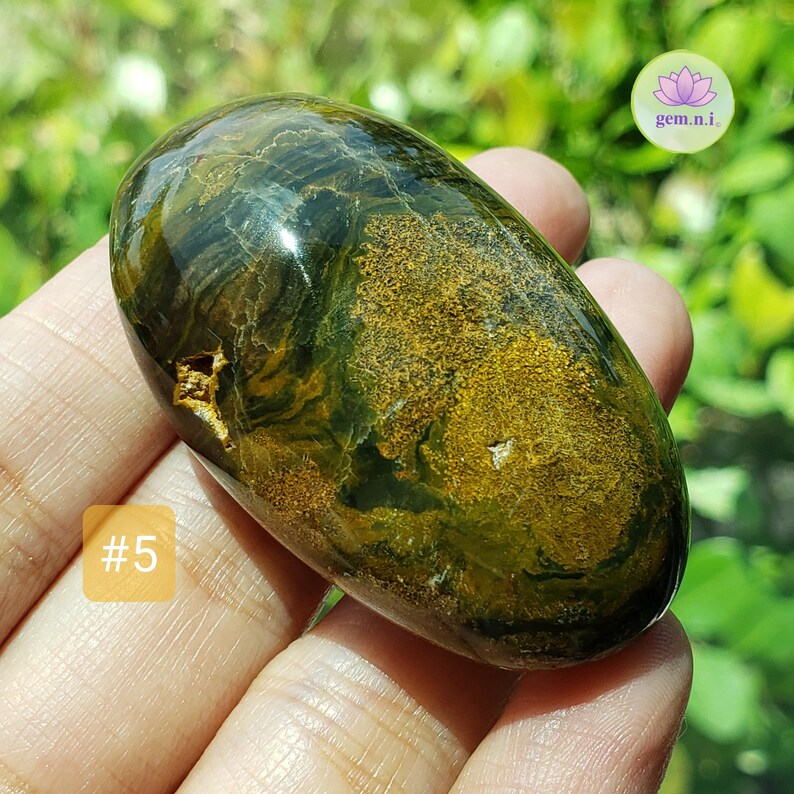 Ocean Jasper palm stones. Choose from the colorful palm stones in various shapes and sizes. These soothing and healing crystal palm stones will add a touch of color to all crystal collection. Ideal crystal gift.