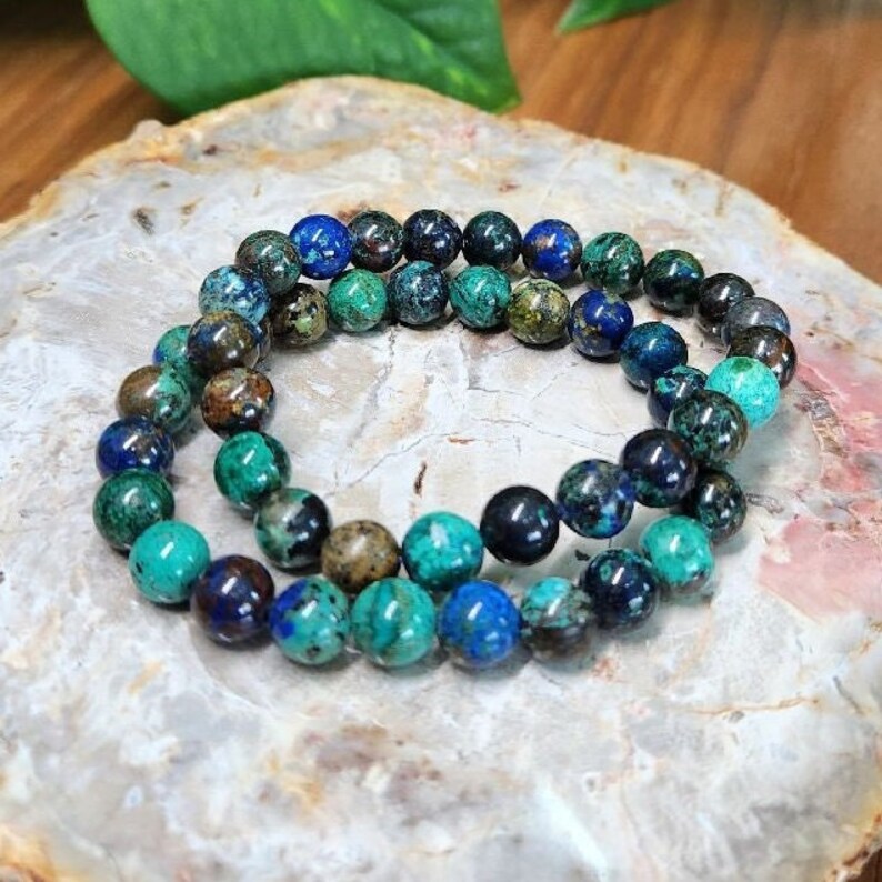 Azurite Malachite gemstone stretchy bracelet in 8mm round beads.These natural crystal bracelets are suitable for men and women. Fits up at 6.5inch wrists, this is known as the stone of heaven.Gift this stunning healing gift to all crystal collectors.