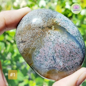 Ocean Jasper palm stones. Choose from the colorful palm stones in various shapes and sizes. These soothing and healing crystal palm stones will add a touch of color to all crystal collection. Ideal crystal gift.