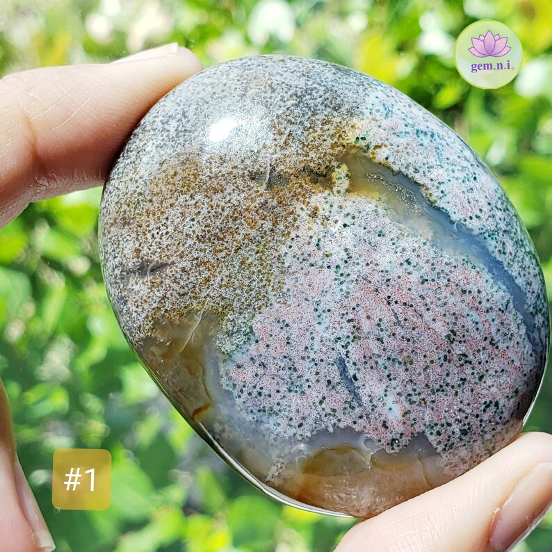 Ocean Jasper palm stones. Choose from the colorful palm stones in various shapes and sizes. These soothing and healing crystal palm stones will add a touch of color to all crystal collection. Ideal crystal gift.