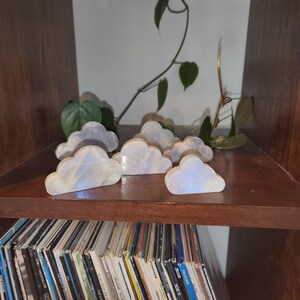 Super flashy Moonstone cloud shape carving in various sizes. Each piece is beautiful on its own. A fun gift to all family and friends. Strong blue and silver flashes in each piece.