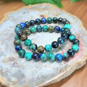 Azurite Malachite gemstone stretchy bracelet in 8mm round beads.These natural crystal bracelets are suitable for men and women. Fits up at 6.5inch wrists, this is known as the stone of heaven.Gift this stunning healing gift to all crystal collectors.