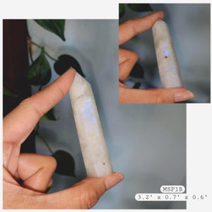 May include: A polished, hexagonal moonstone crystal tower with a milky white appearance and iridescent blue flashes. The crystal measures 3.2 inches by 0.7 inches by 0.6 inches, as indicated by the text label MSP1B on the image.