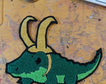 A cute croc with a hat embroidery file pack