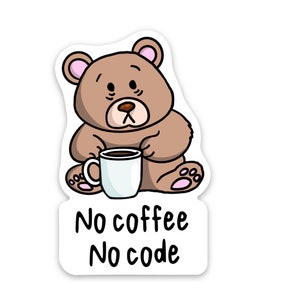 May include: A brown cartoon bear with pink ears sits holding a white coffee mug. The text "No coffee No code" is below the bear.