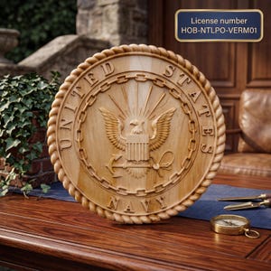 May include: A round, wooden United States Navy plaque with a carved eagle, anchor, and text. The plaque is surrounded by a rope-like border and the words "UNITED STATES NAVY". A license number is visible in the upper right corner.