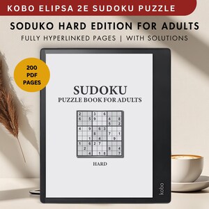 Peut inclure: Une liseuse noir et blanc avec un écran blanc affichant un livre de Sudoku pour adultes. L'écran affiche le texte "Sudoku Puzzle Book for Adults" et un exemple de Sudoku intitulé "Hard". La liseuse a une lunette noire et le texte "kobo" est visible en bas à droite. La liseuse est posée sur une surface blanche avec une plante brune et une tasse de café en arrière-plan.