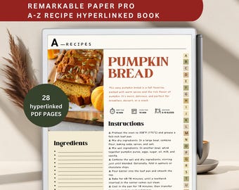 May include: A digital recipe book on a tablet, featuring a pumpkin bread recipe. The screen displays the title "Pumpkin Bread" with instructions and ingredients. The book has 28 hyperlinked PDF pages. A stylus and a cup are on the side.