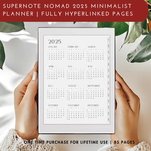 May include: A white digital planner with a black border, displaying a calendar for the year 2025. The calendar is divided into twelve months, with each month having its own grid. The planner is being held by a person's hands. The text "SUPERNOTE NOMAD 2025 MINIMALIST PLANNER | FULLY HYPERLINKED PAGES" is at the top of the image. The text "ONE TIME PURCHASE FOR LIFETIME USE | 85 PAGES" is at the bottom of the image.