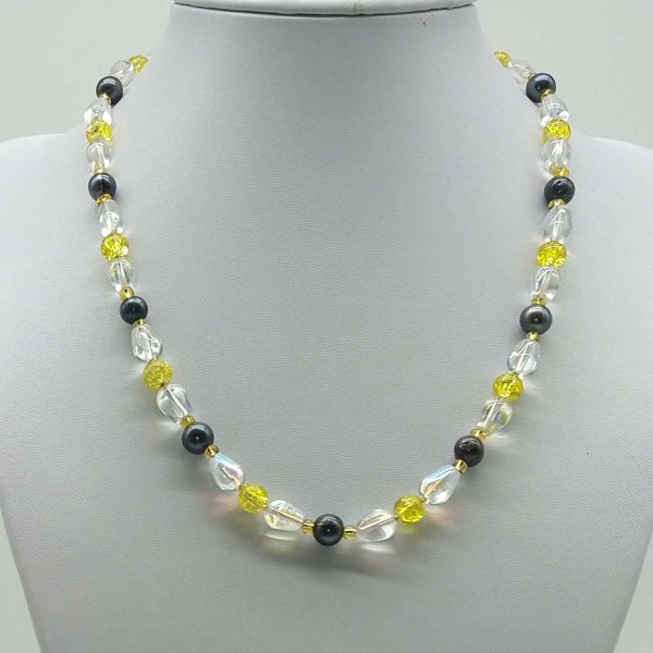 40233 Collier avec perles de cristal de roche jaune, olives cristal de roche transparente et perles d’hématite.