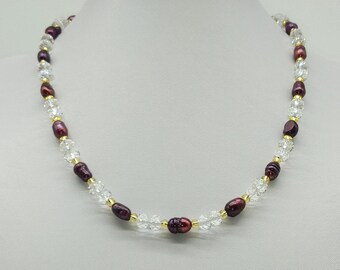 40102 Necklace with dark red colored baroque freshwater pearls and transparent glass crystals