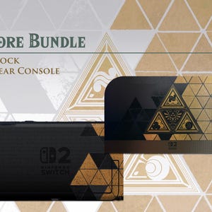 May include: A Nintendo Switch Core Bundle featuring a black and gold console dock and a rear console plate. The dock displays a central triangular emblem with intricate gold line art, while the rear plate features a matching geometric pattern.
