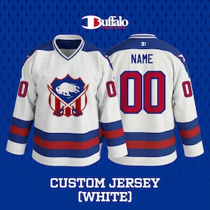 May include: White custom hockey jersey with blue and red accents. The jersey features a buffalo logo on the front and the text "NAME" and the number "00" on the back. The jersey has a v-neck collar and long sleeves. The text "CUSTOM JERSEY (WHITE)" is at the bottom.