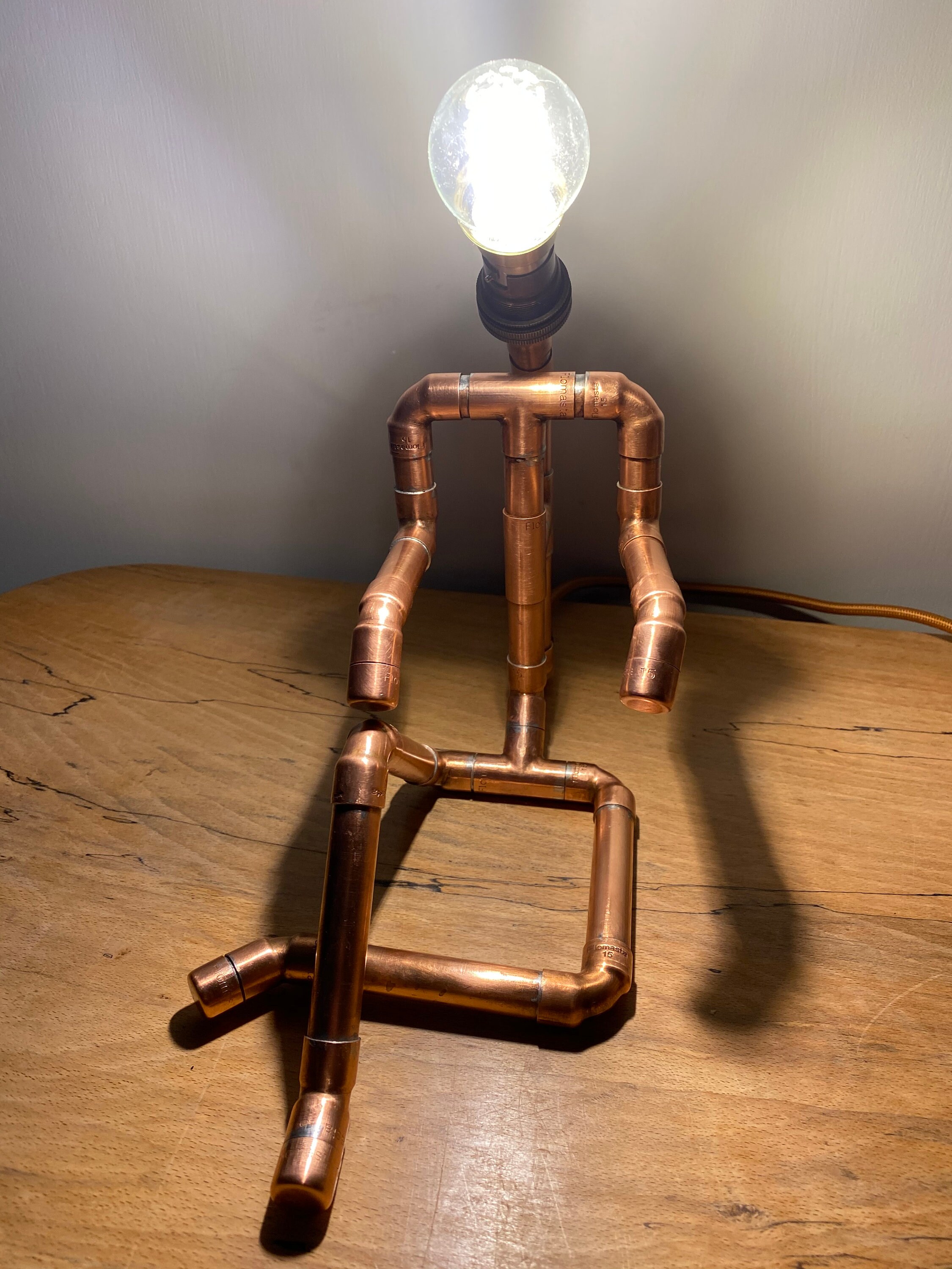 Copper Pipe Sitting Man Lamp Etsy UK