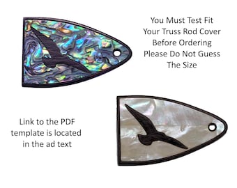 May include: Two triangular guitar truss rod covers with a dark wood border and a dark wood bird inlay. One cover features an iridescent abalone shell background, while the other has a white mother-of-pearl background. Text reads: You Must Test Fit Your Truss Rod Cover Before Ordering Please Do Not Guess The Size. Link to the PDF template is located in the ad text.