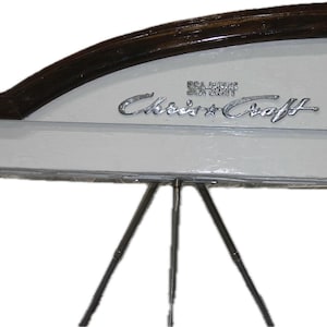 1958 CHRIS CRAFT SCULPTURE - This piece of art was chainsawed out of a vintage Sea Skiff and turned into a neat sculpture showcased here.