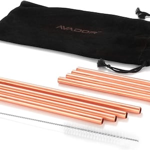 May include: Set of 8 rose gold stainless steel drinking straws, 4 straight and 4 bent, with a cleaning brush and a black velvet carrying pouch with the word "AVADOR" printed on it.
