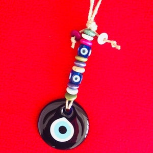 evil eye hanging, evil eye hanging decor, evil eye hanging charm, evil eye hanging decoration, evil eye hanging wall, blue evil eye bead