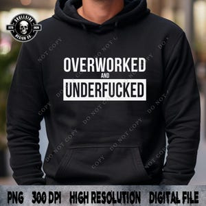 May include: Black hoodie featuring the white text "OVERWORKED AND UNDERFUCKED". The hoodie has a front pocket and a hood. The Skullside Design Co. logo is in the upper left corner.