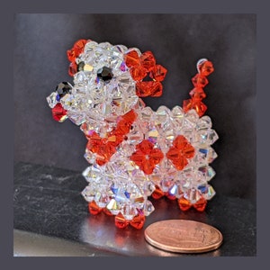 Charming Swarovski Crystal dog figurines. White dogs with different colored patches. Choice of colors. Each sold separately.