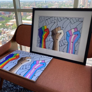 May include: Three raised fists with different colored stripes on their arms. The fists are raised in solidarity. The fists are on a white background with a gray pattern. The image is framed in black.