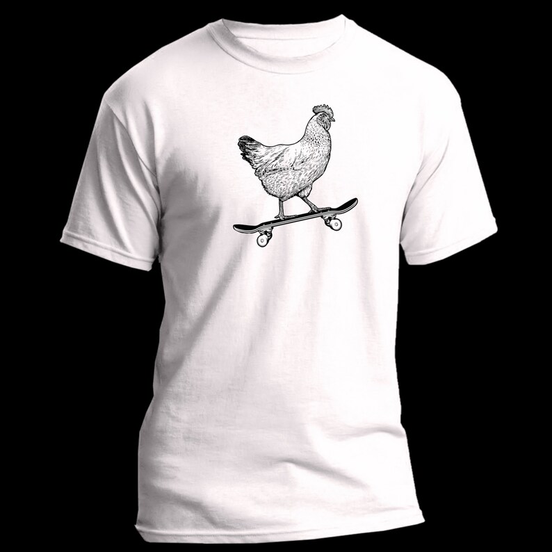 May include: A white t-shirt with a black and white illustration of a chicken skateboarding.