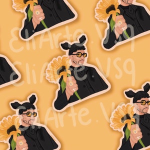 May include: A digital illustration of a person wearing a black jacket and a black beanie with bunny ears. The person is holding a sunflower with a yellow center and brown petals. The background is a yellow color.