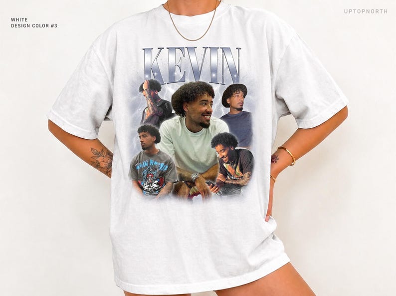 May include: A white short-sleeve t-shirt featuring a graphic print with the name KEVIN in large metallic-style letters at the top. The design includes five photographic portraits of a person with curly hair in various poses.