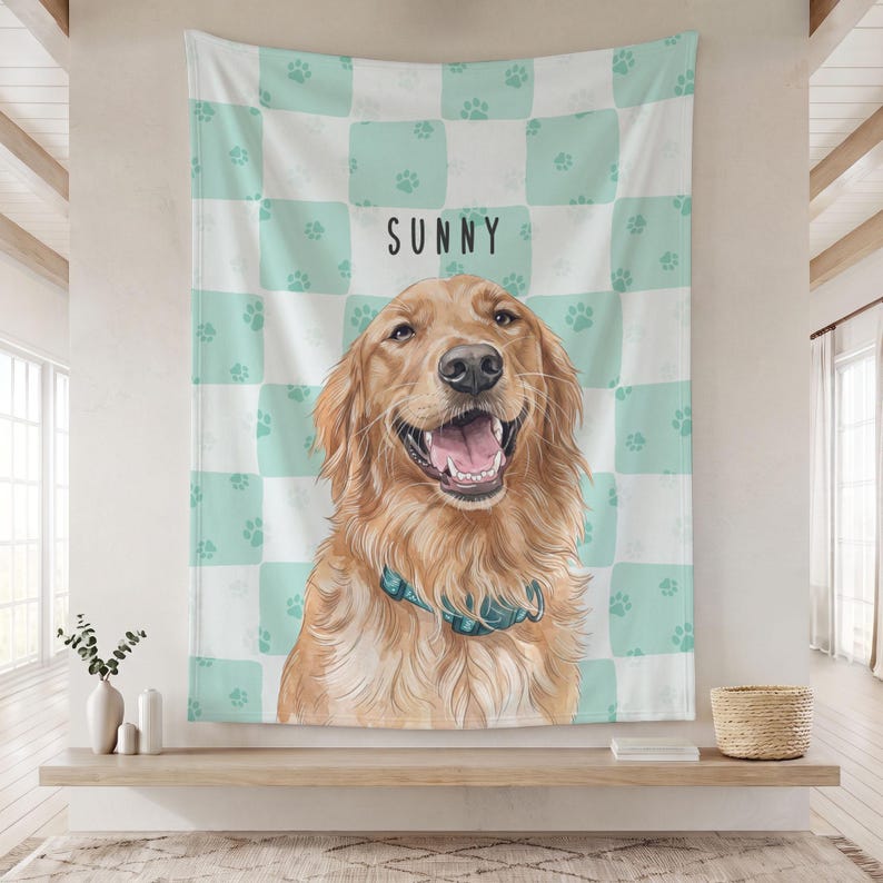 May include: A rectangular wall tapestry featuring a golden retriever illustration with a blue collar. The background has a light mint green and white checkered pattern with small paw prints. The name SUNNY is printed in black text.