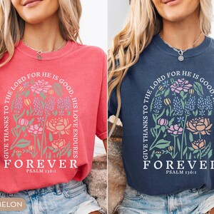 May include: Two t-shirts, one watermelon and one denim, with floral designs and the text "GIVE THANKS TO THE LORD FOR HE IS GOOD, HIS LOVE ENDURES, FOREVER, PSALM 136:1." The shirts are short-sleeved and have a crew neck.