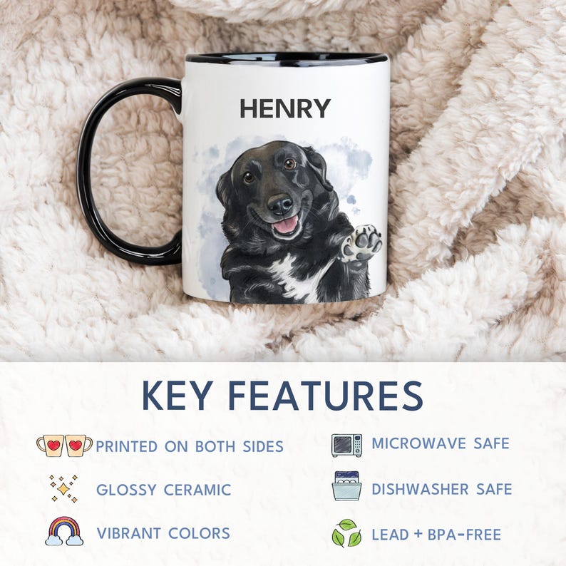 May include: White ceramic mug with a black handle and rim, featuring a watercolor illustration of a black dog with the name "HENRY". The mug is printed on both sides, microwave and dishwasher safe.
